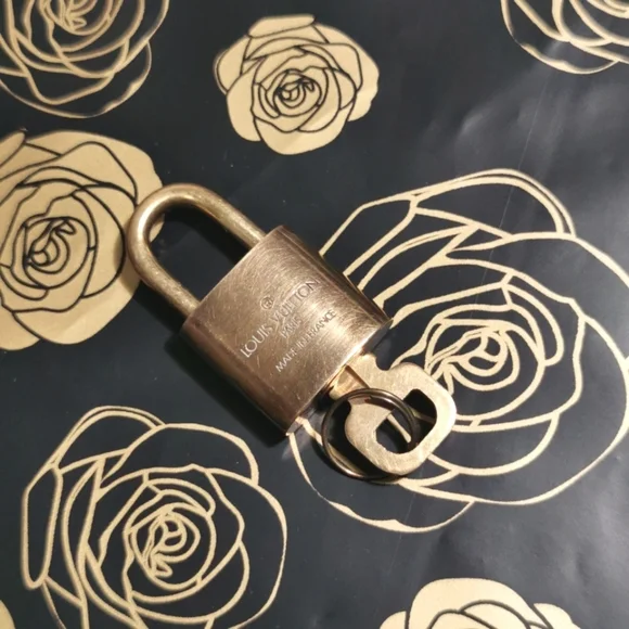 #305 Authentic Louis Vuitton lock and key set - Picture 2 of 4